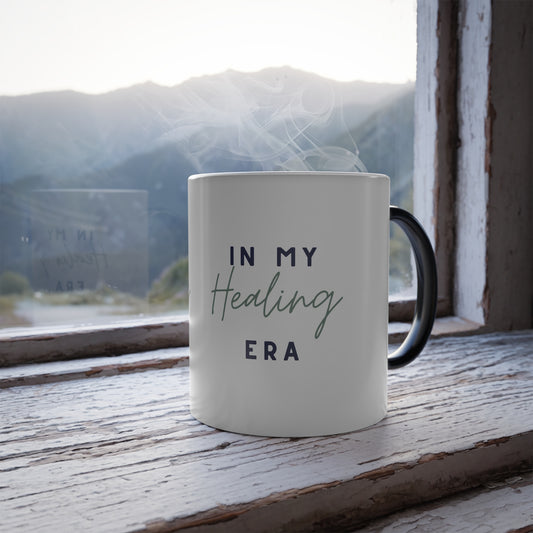 "In my healing era" Mug sitting on a windowsill